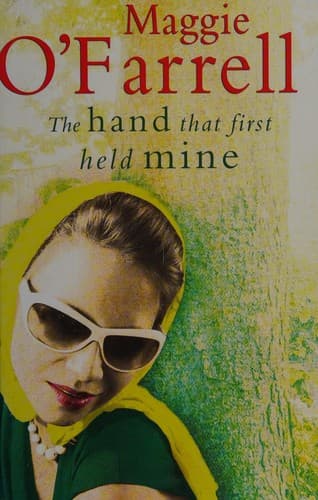 Tapa de The hand that first held mine