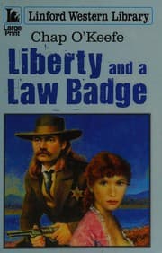 Tapa de Liberty and a law badge