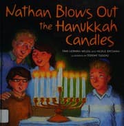 Tapa de Nathan blows out the Hanukkah candles