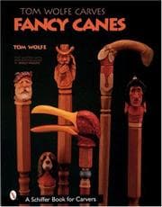Tapa de Tom Wolfe carves fancy canes
