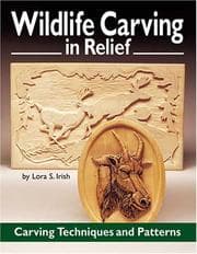 Tapa de Wildlife carving in relief