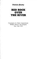 Tapa de Red rock over the river.