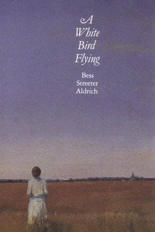 Tapa de A white bird flying