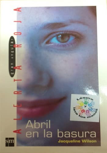 Tapa de Abril en la basura