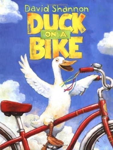 Tapa de Duck on a bike
