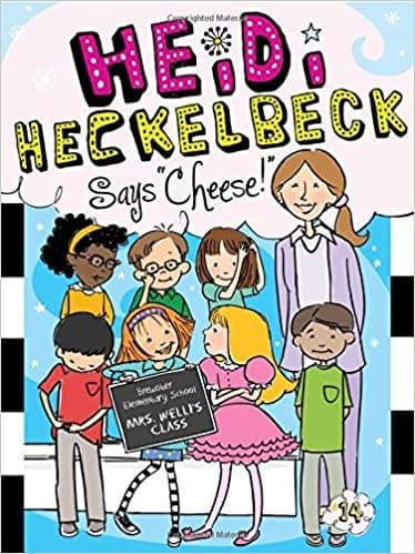 Tapa de Heidi Heckelbeck says "cheese!"