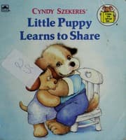 Tapa de Cindy Szekeres' little puppy learns to share