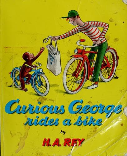 Tapa de Curious George rides a bike